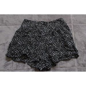 Black shorts with white flowers
